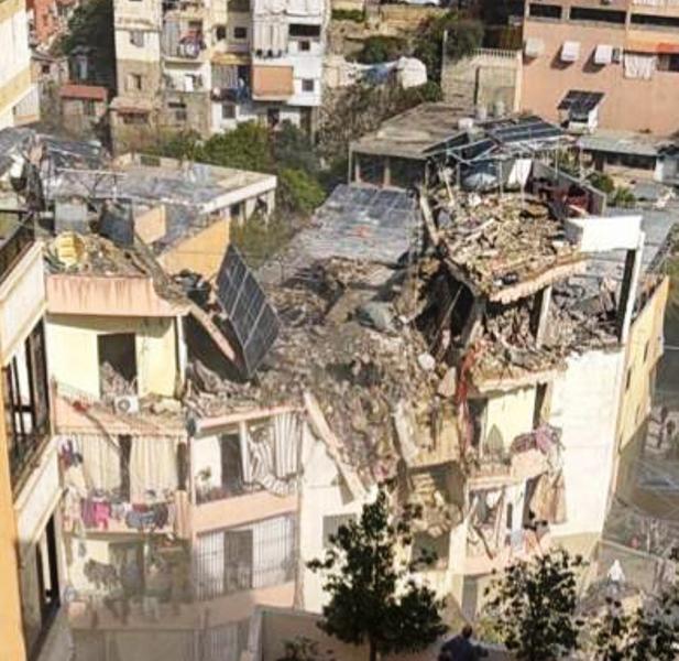 بالفيديو والصور :  اكثر من 13 شهيدا في الغارة على "مشاريع الهبة" وفرق الانقاذ ما زالت تبحث عن مفقودين